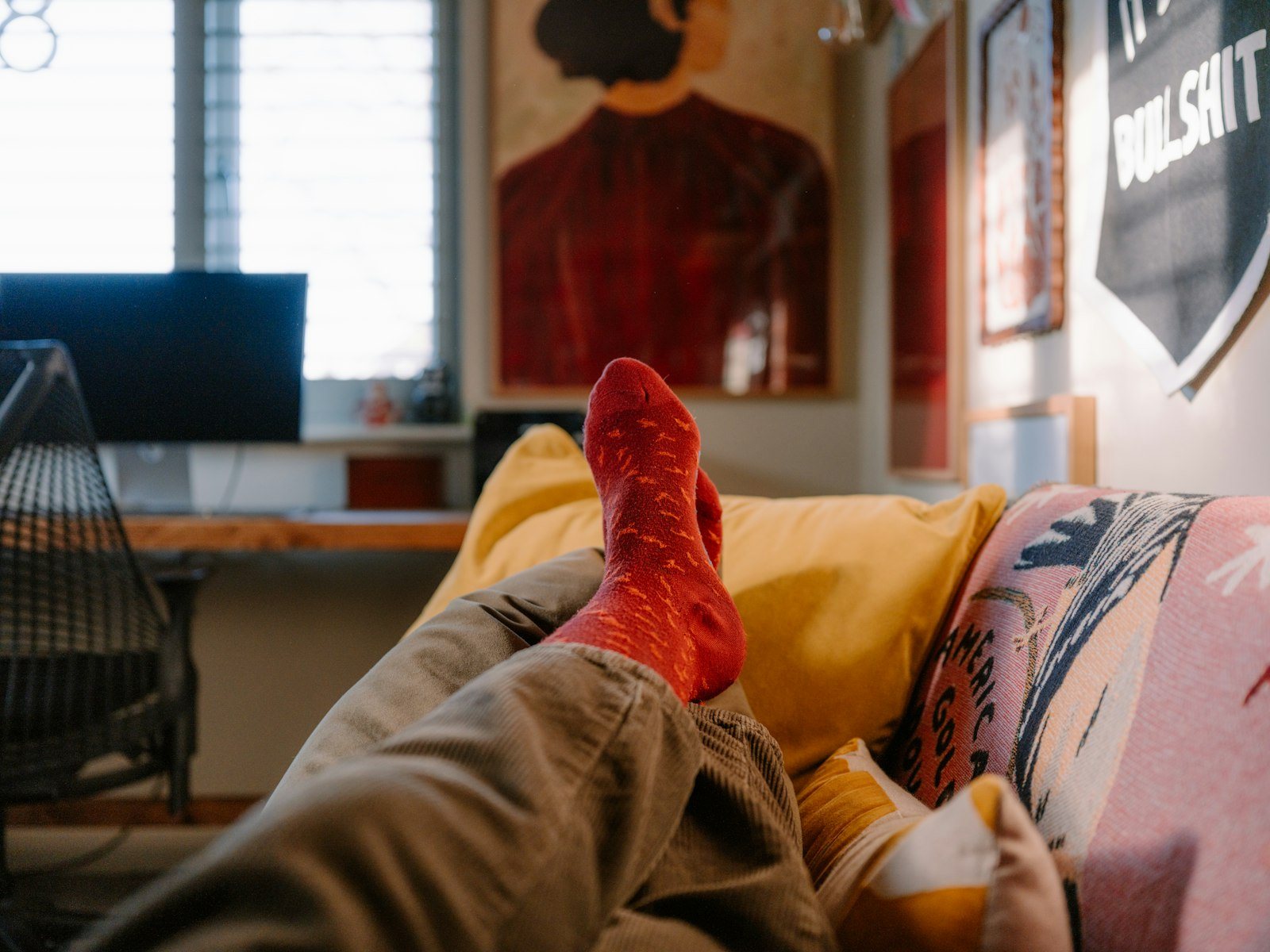 A person resting with the legs elevated