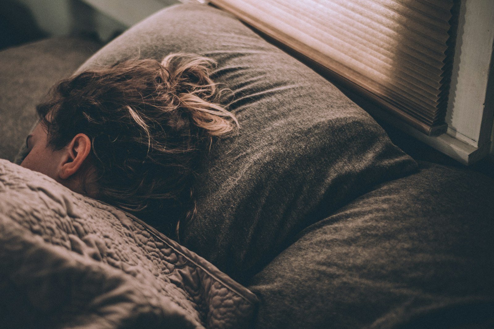 A person lying awake at night