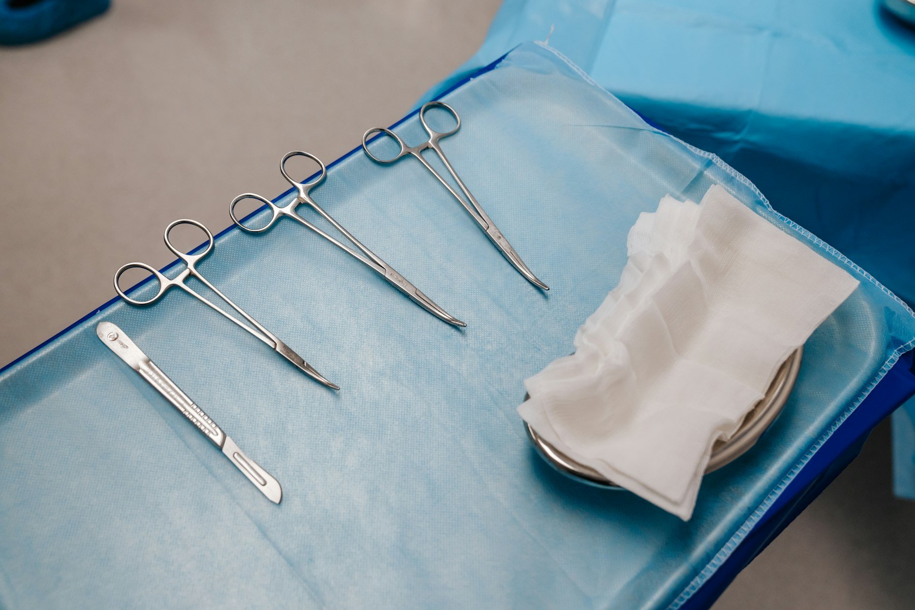 Sterile instruments laid out on a clinical tray