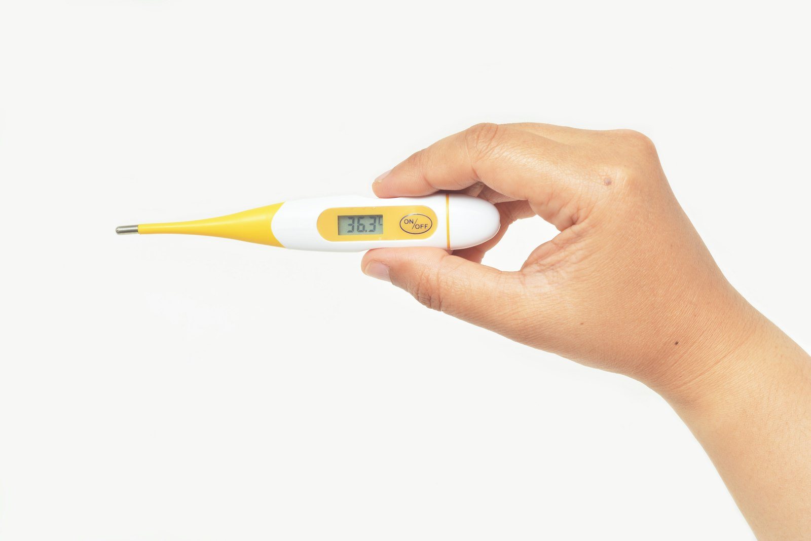 A clinical thermometer being read