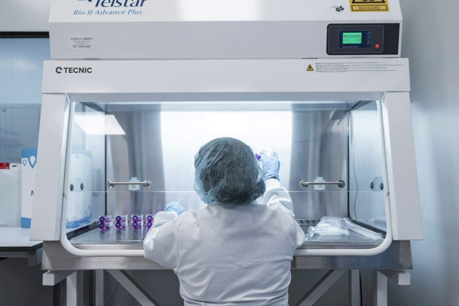 A pharmacist preparing an intravenous medication