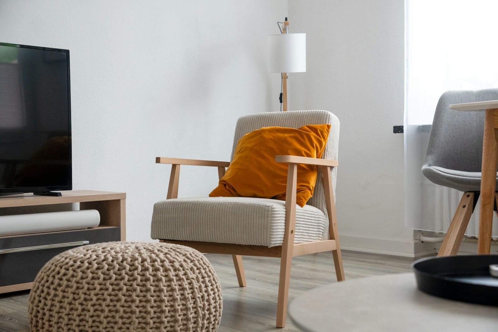 A comfortable armchair in a bright living room