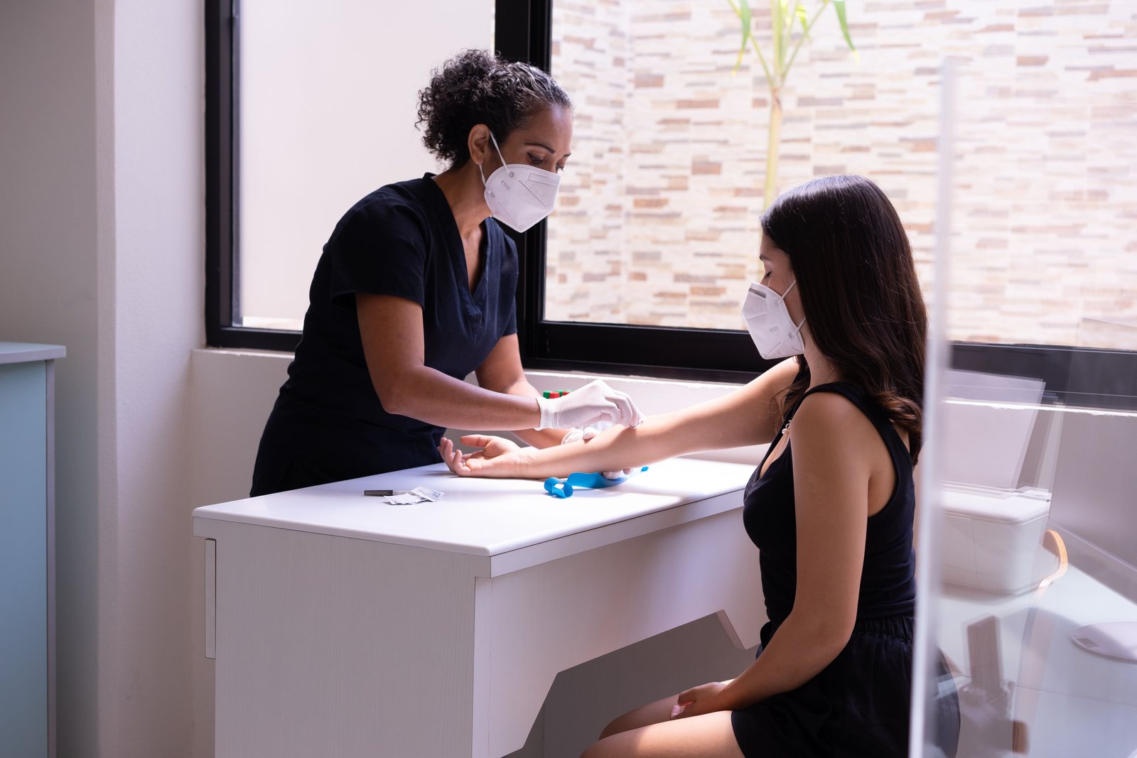 A skin test being performed on a forearm
