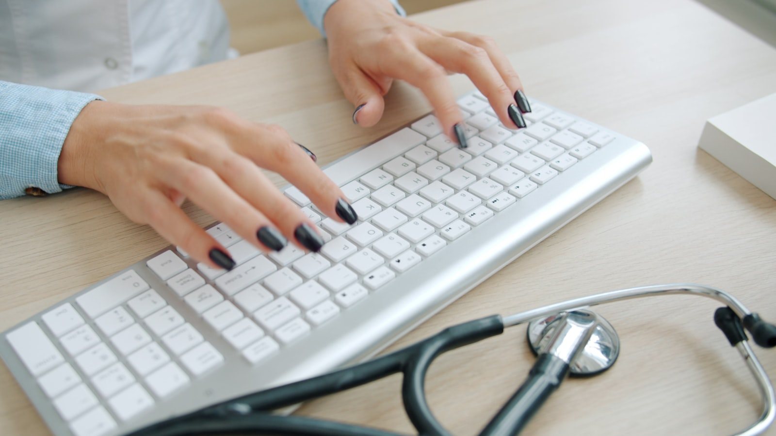 Patient records on a clinic desk