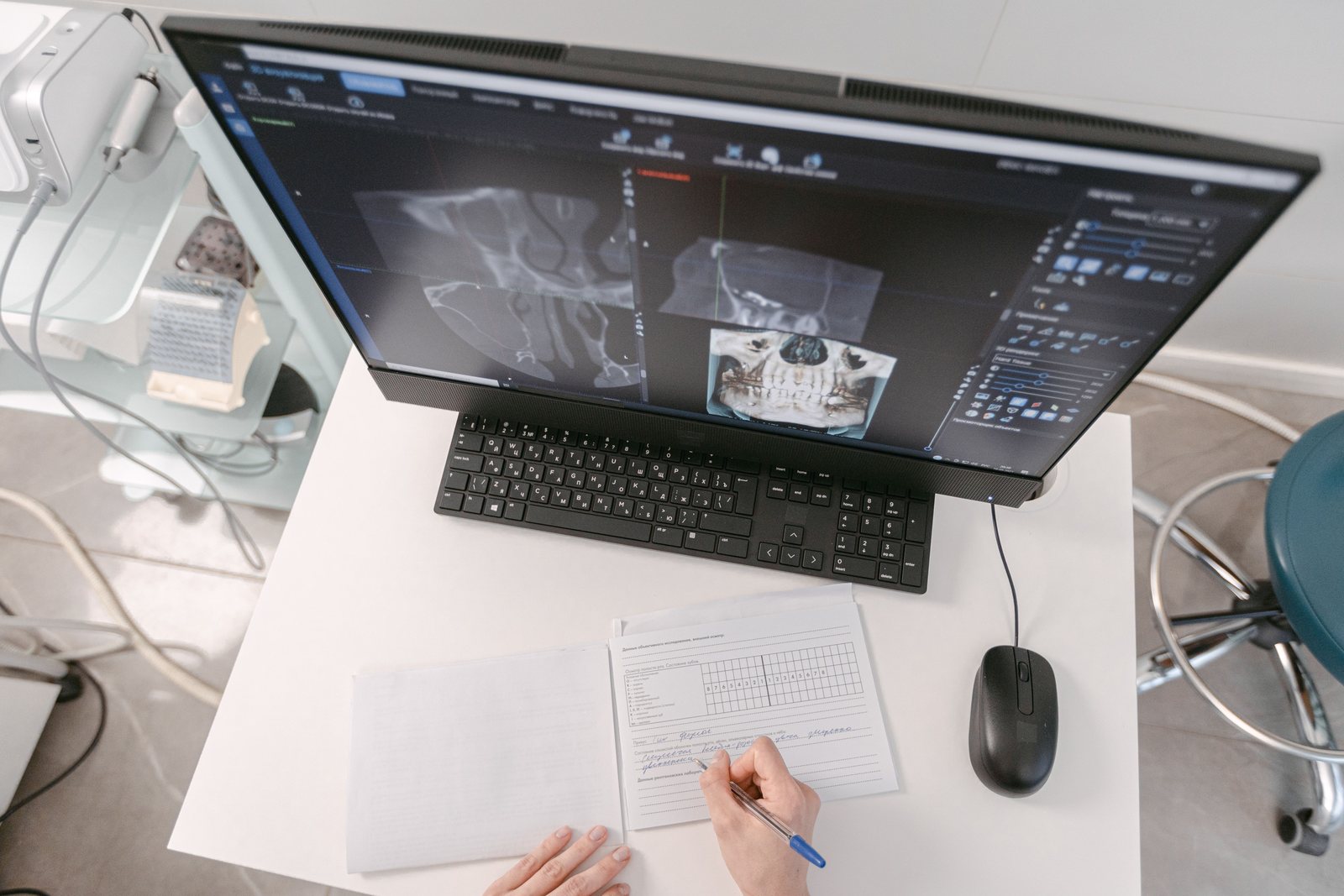 A radiologist reviewing X-ray images on a screen