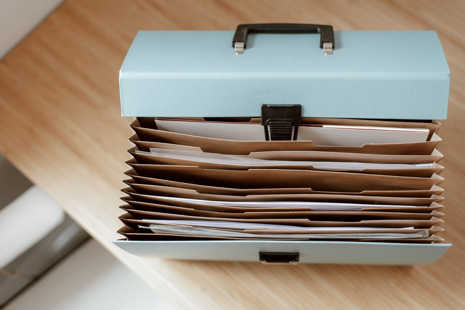 A document case holding papers on a table
